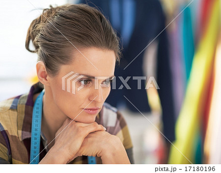 Portrait of stressed tailor woman at work 17180196