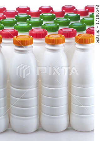 dairy products bottles with bright covers 17186543