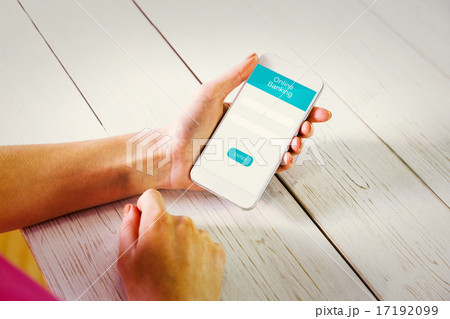 Composite image of woman using smartphone 17192099