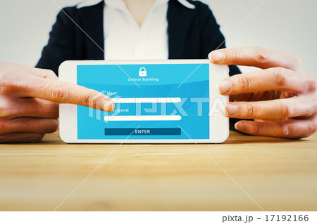Composite image of businesswoman using her tablet pc Composite image of businesswoman using her tablet pc 17192166