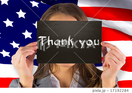 Composite image of businesswoman showing card Composite image of businesswoman showing card 17192284