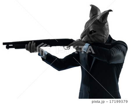 man with rabbit mask hunting with shotgun silhouette portrait 17199379
