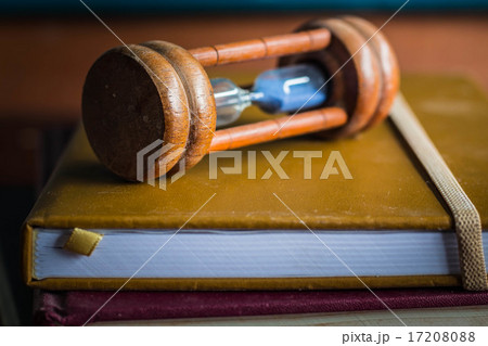Hourglass placed on the book 17208088