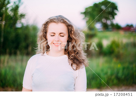 Portrait Of Beautiful Plus Size Young Woman In White Shirt Posin Portrait Of Beautiful Plus Size Young Woman In White Shirt Posin 17208451