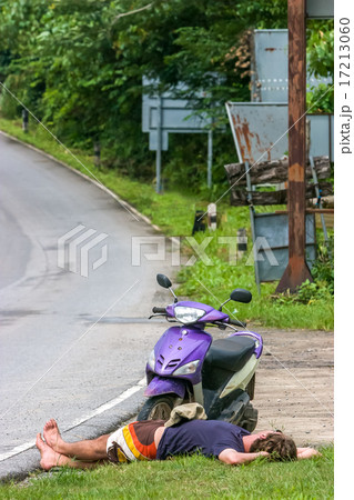 tourist having a nap beside street Koh Chang 17213060