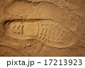 Boot footprint on the sand 17213923