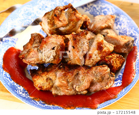 shashlik plate with skewer on the kitchen board shashlik plate with skewer on the kitchen board 17215548