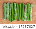 Frozen eleven sticks of asparagus on wooden 17237627