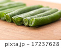 Frozen sticks of asparagus on wood background 17237628