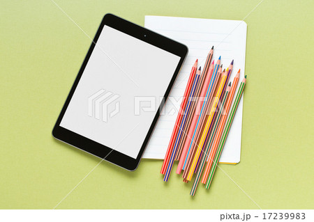 colored pencil , blank notebook and tablet 17239983