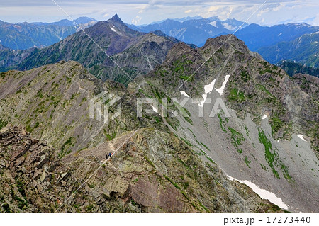 奥穂高岳から見る北穂高岳と槍ヶ岳の写真素材