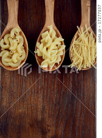 Tree spoons with different kinds of pasta 17277837
