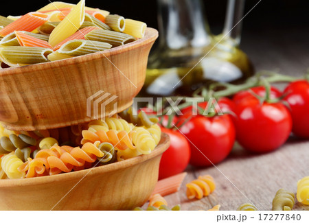 Raw eliche and penne tricolori pasta  17277840