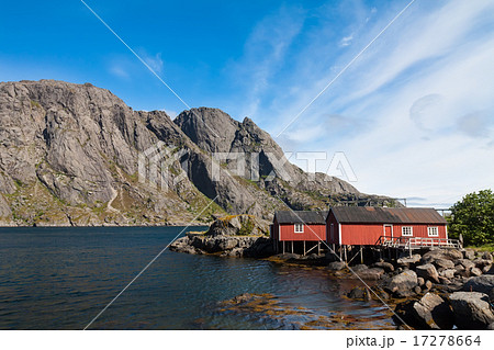 Typical red rorbu fishing hut in village Nusfjord 17278664