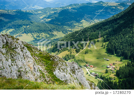 Single house on a meadow in mountains 17280270