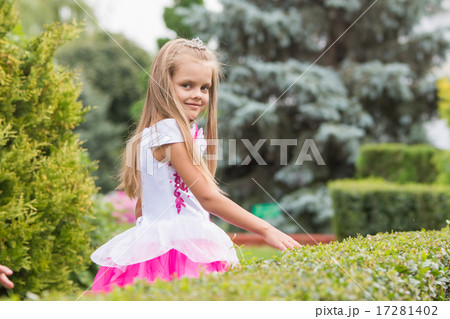 Princess Girl walks in the garden 17281402