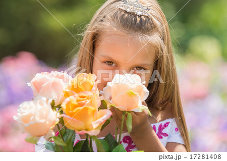 Girl princess with a bouquet of roses 17281408