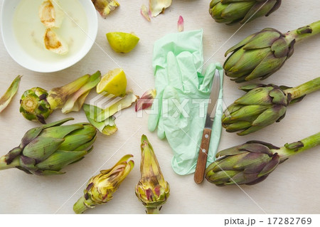 The process of peeling and cleaning artichoke The process of peeling and cleaning artichoke 17282769