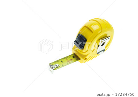 Close up new yellow measuring tape isolated on white 17284750