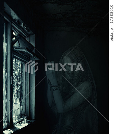 blured woman ghost praying in old house blured woman ghost praying in old house 17288610