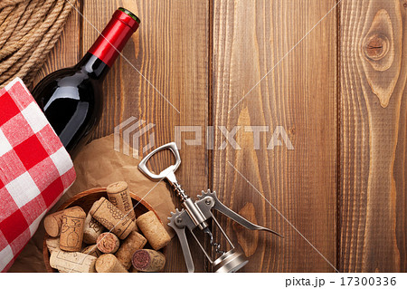 Red wine bottle, corks and corkscrew Red wine bottle, corks and corkscrew 17300336