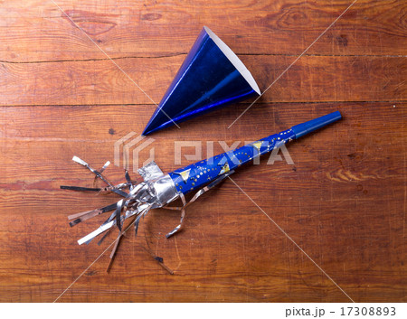 party hat on wood table. birthday background party hat on wood table. birthday background 17308893