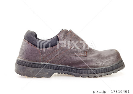 Old black safety shoe for worker 17316461