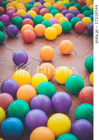 Colorful plastic ball in playground Colorful plastic ball in playground 17316544