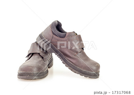 Old black safety shoe for worker Old black safety shoe for worker 17317068