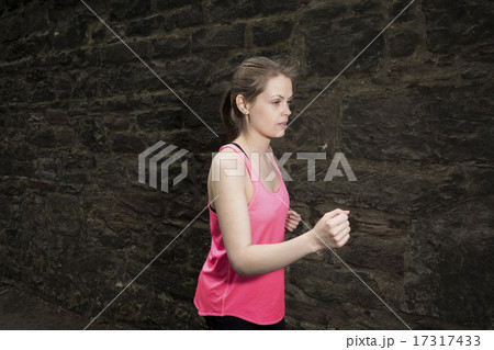 Sporty woman during fitness training outdoors. Sporty woman during fitness training outdoors. 17317433