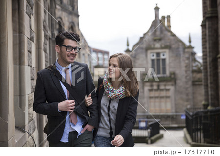 Romantic happy couple walking down the street. Romantic happy couple walking down the street. 17317710
