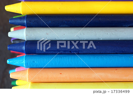 Oil pastel crayons on a wooden black table Oil pastel crayons on a wooden black table 17336499