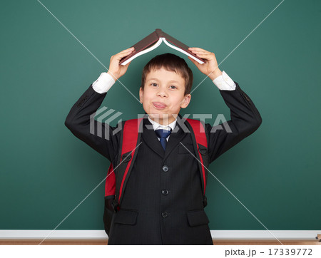 sleepy boy in suit on school board with graph sleepy boy in suit on school board with graph 17339772