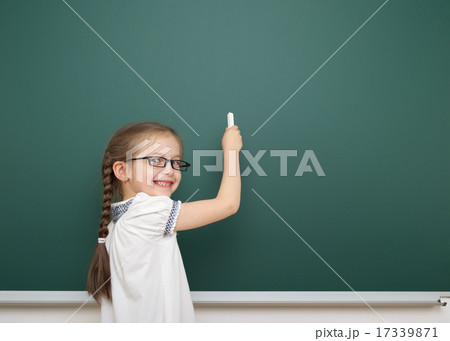 Schoolgirl near school board 17339871