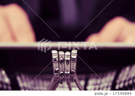 typebars of old typewriter forming the word love 17340884