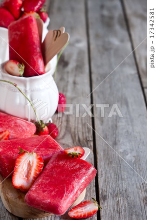 Strawberry popsicles background 17342581
