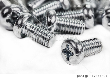 Closeup metal screw and nuts on white background. 17344804