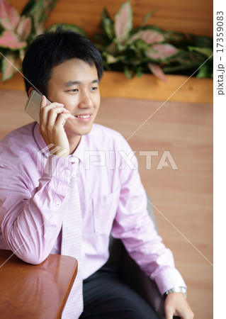 Businessman is using smartphone Businessman is using smartphone 17359083