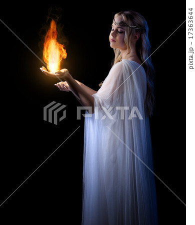Young elven girl with fire isolated Young elven girl with fire isolated 17363644