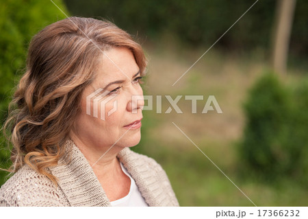 Beautiful senior lady is thinking about her life 17366232