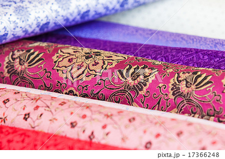 Rolls of fabric and textiles in a factory shop Rolls of fabric and textiles in a factory shop 17366248