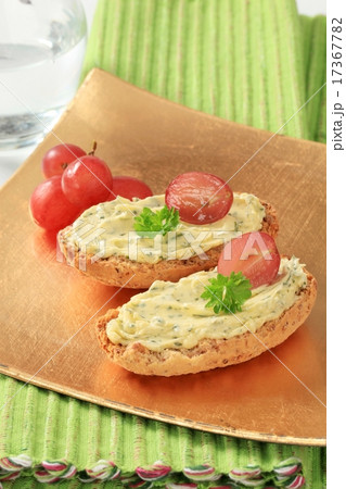 Whole grain crisp rolls with herb butter Whole grain crisp rolls with herb butter 17367782