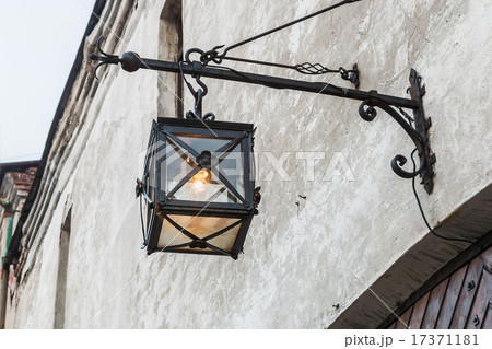 Ancient lantern on the wall Ancient lantern on the wall 17371181