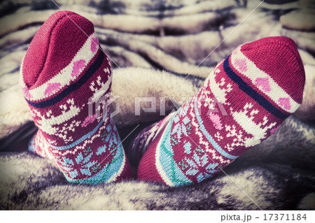 Female legs in Christmas socks 17371184