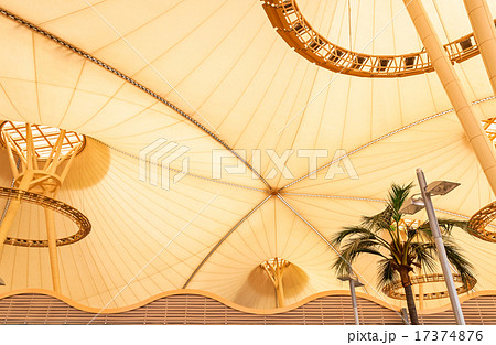 Big yellow canvas tent roof with palm tree Big yellow canvas tent roof with palm tree 17374876