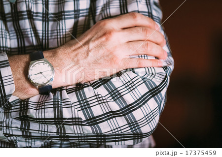Close Up Vintage Old Watch On Man Hand. Striped Shirt Close Up Vintage Old Watch On Man Hand. Striped Shirt 17375459