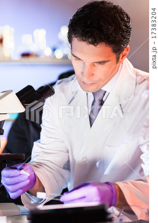 Life scientist researching in the laboratory. Life scientist researching in the laboratory. 17383204
