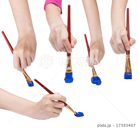 set of hands with art paintbrushes with blue tips 17383407