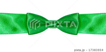 symmetric bow knot on green satin ribbon close up symmetric bow knot on green satin ribbon close up 17383934