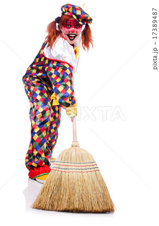 Clown with broom isolated on white Clown with broom isolated on white 17389487